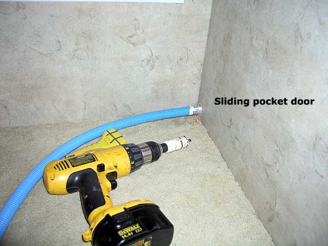 Hole through pocket door