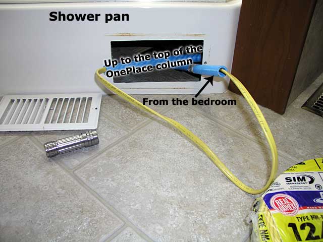 Under the shower pan